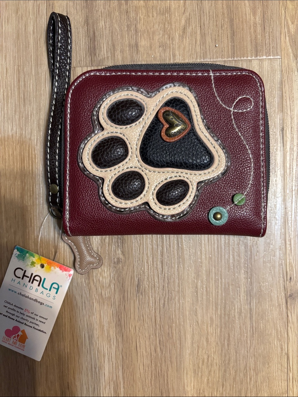 Chala Burgundy and Black Paw Print Zip Wristlet
